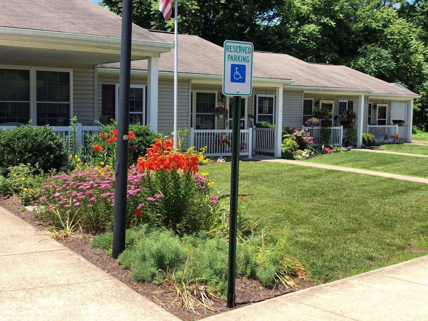 A reserved parking sign for handicap